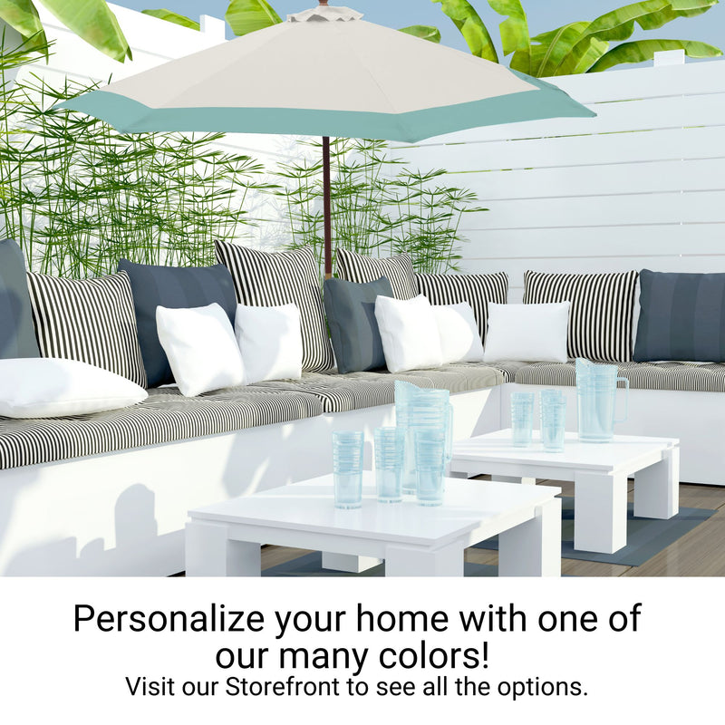 Outdoor patio scene featuring a white sectional sofa with striped and solid throw pillows, a large Formosa Covers 9ft Market Patio Umbrella 6 Rib Replacement Canopy Duet Light Blue providing shade, and white coffee tables with clear plastic cups. Green leafy plants are visible in the background. Text overlay reads: "Personalize your home with one of our many colors! Visit our Storefront to see all the options.