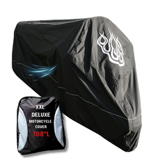 A black, heavy-duty motorcycle cover featuring a flame emblem partially shields the bike. This XXL Premium model by Formosa Covers measures 108 inches in length and is UV treated for extra protection. A matching storage bag with the Night Reflector design is displayed in the lower left corner.