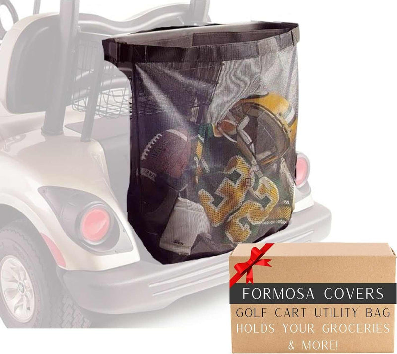 A Golf Cart Mesh Utility Grocery Bag Attachment from Formosa Covers, featuring a universal fit and made with durable mesh fabric for ventilation, is mounted on the back of a white golf cart. A cardboard box adorned with a red bow is labeled "Formosa Covers Golf Cart Mesh Utility Grocery Bag Attachment (Universal Fit) Holds Your Groceries & More!