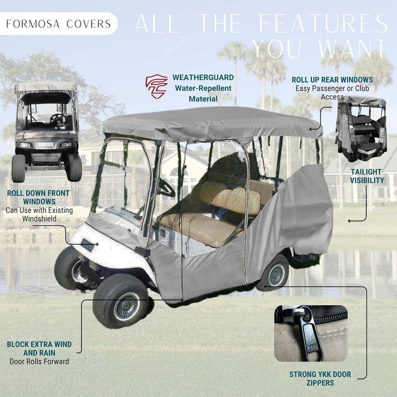 The 4 Passenger Golf Cart Driving Enclosure Cover (4 Seater Long Roof 80") in Grey by Formosa Covers features a gray canvas cover with roll-down front windows, roll-up rear windows, taillight visibility, and water-repellent material. It includes strong YKK zippers for protection against wind and rain, making it perfect for driving through a grassy landscape in your golf cart.