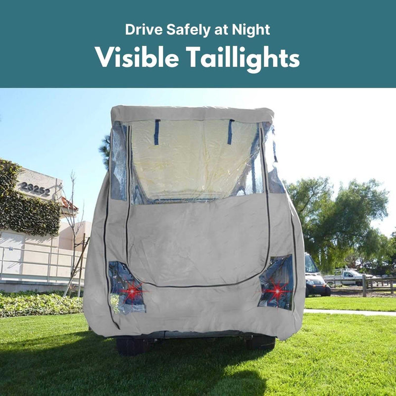 A grey 4 Passenger Golf Cart Driving Enclosure Cover by Formosa Covers, featuring clear panels, fits snugly over a 4-seater golf cart with an 80" long roof, ensuring taillights are visible. The text at the top reads, "Drive Safely at Night - Visible Taillights." The cart is parked on grass with houses and trees in the background.