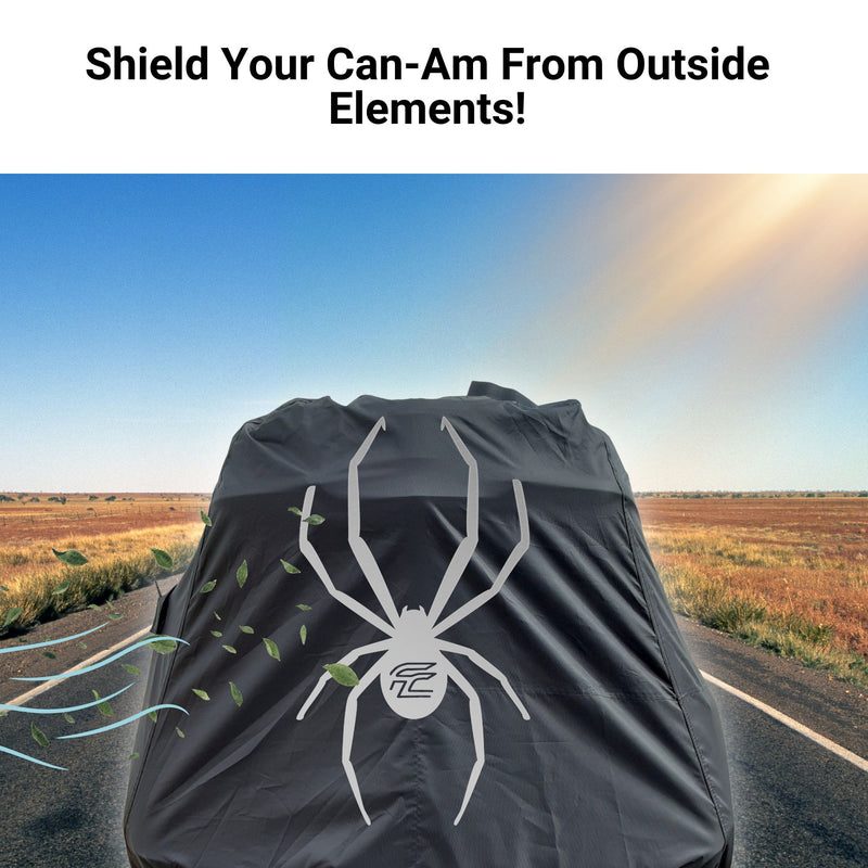 A Can-Am Spyder RS is protected by a Formosa Covers Can-Am Spyder Sport Model Full Cover for RS, ST, ST-S, F3, and F3-S featuring a large spider design. Positioned on an open road with fields on either side and leaves blown by the wind visible around the vehicle, the text above reads, "Shield Your Can-Am From Outside Elements!