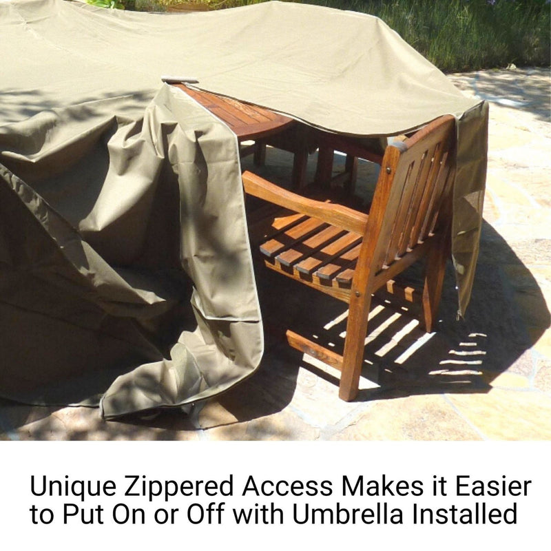 A wooden patio table and chairs covered by a Formosa Covers Patio Conversation Set Cover for Round Table, 104"Dia. x 31"H with Umbrella Hole, in classic taupe. The mildew-resistant cover features unique zippered access and is partially removed to reveal the table and chairs underneath. Text overlay at the bottom reads, "Unique Zippered Access Makes It Easier to Put On or Off with Umbrella Installed.