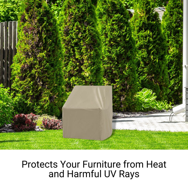 A Formosa Covers Patio Outdoor Club Chair Cover in Classic Taupe protects a piece of outdoor furniture on a neatly mowed lawn with tall evergreen trees in the background. The text below reads, "Protects Your Furniture from Heat and Harmful UV Rays.