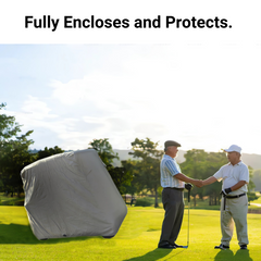 Two men stand on a golf course, shaking hands while holding golf clubs. The man on the left is wearing a hat, and both are dressed in golf attire. To their left hovers a large, partially transparent gray cover labeled 