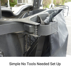 Close-up of the durable mesh fabric Golf Cart Mesh Utility Grocery Bag Attachment (Universal Fit) by Formosa Covers, secured to a vehicle with a strap and buckle mechanism, demonstrating a no-tools-needed setup. The black bag is attached to a metallic frame, and the text 