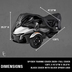 A three-wheeled motorcycle partially covered by a black cover with a silver spider logo. Text reads 